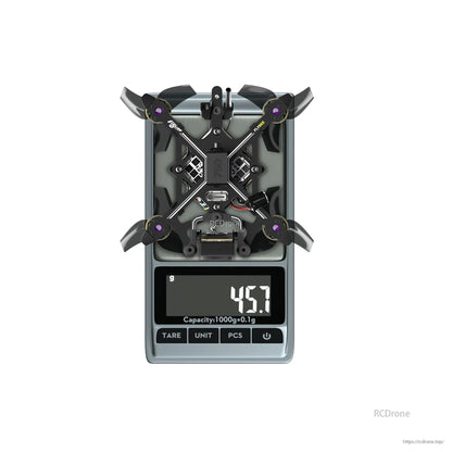 Flybee 16 HD O4 2S Ultralight FPV, Flybee 16 HD O4 ultralight FPV drone on a digital scale, showing a weight reading of 45.7 g
