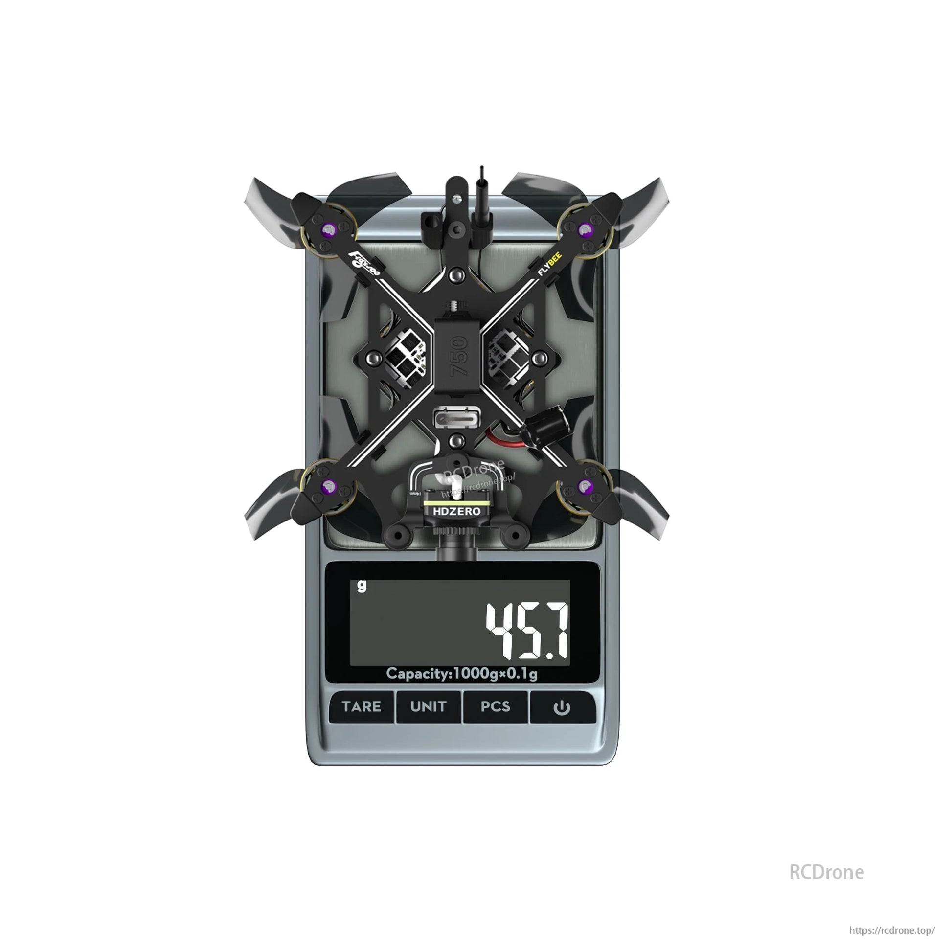 Flybee 16 HDZero 2S Ultralight FPV, Flybee 16 HDZero ultralight FPV quadcopter on a digital scale with the display reading 45.7 g