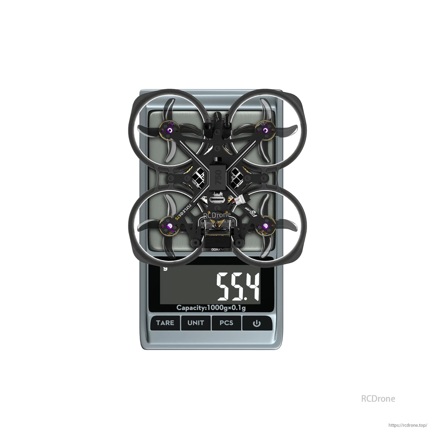 Flylens 75 HD O4 Wide 2S whoop FPV drone with ducted prop guards on a scale reading 55.4g