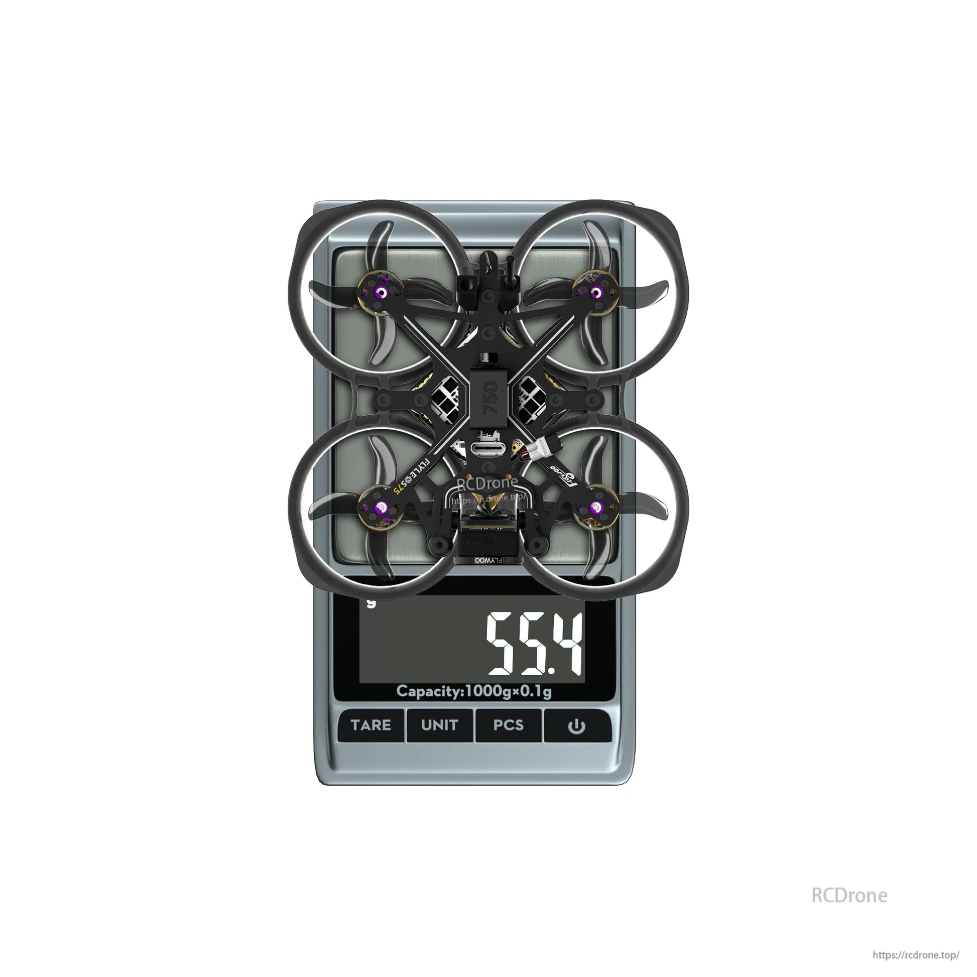 Flylens 75 HD O4 Wide 2S whoop FPV drone with ducted prop guards on a scale reading 55.4g