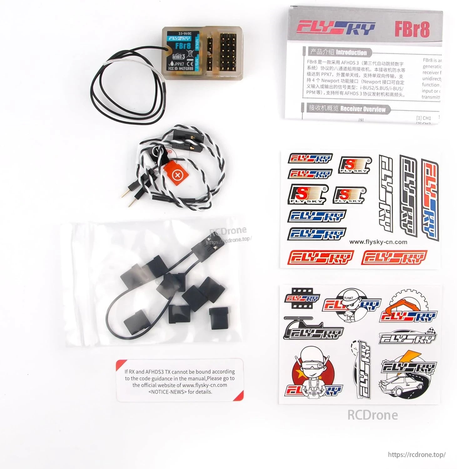 Box contents: Flysky FBr8 receiver, manual, decal sheet, servo leads, and accessory cables
