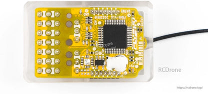 Bottom view of receiver showing exposed PCB with microcontroller and solder pads