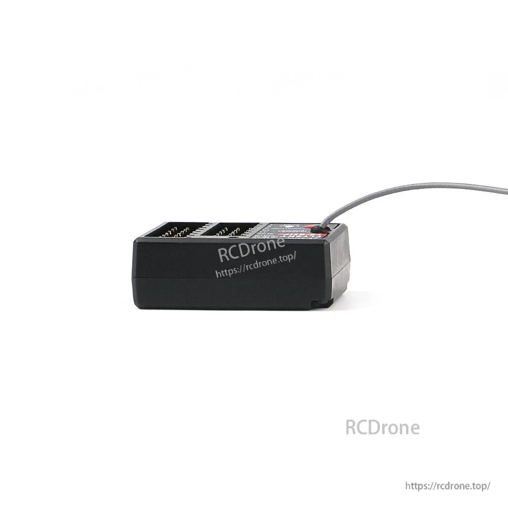 Low side profile of receiver showing case height and antenna routing along the edge