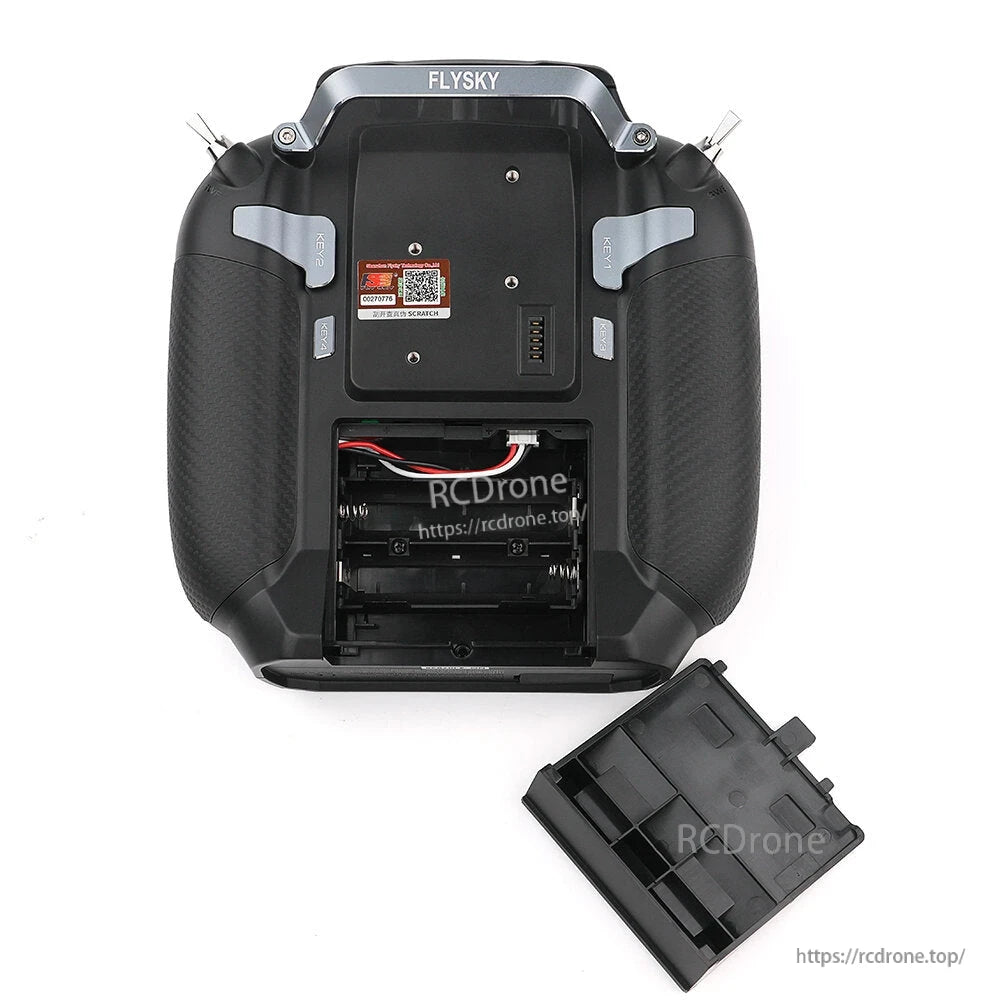 Rear view of Flysky FS-ST16 transmitter with battery compartment open and battery cover removed