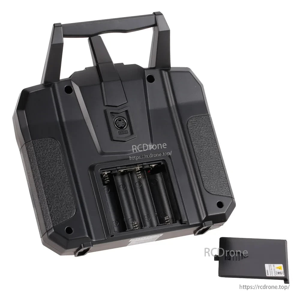 Back of FS-i6X transmitter with 4x AA battery compartment and removable battery door
