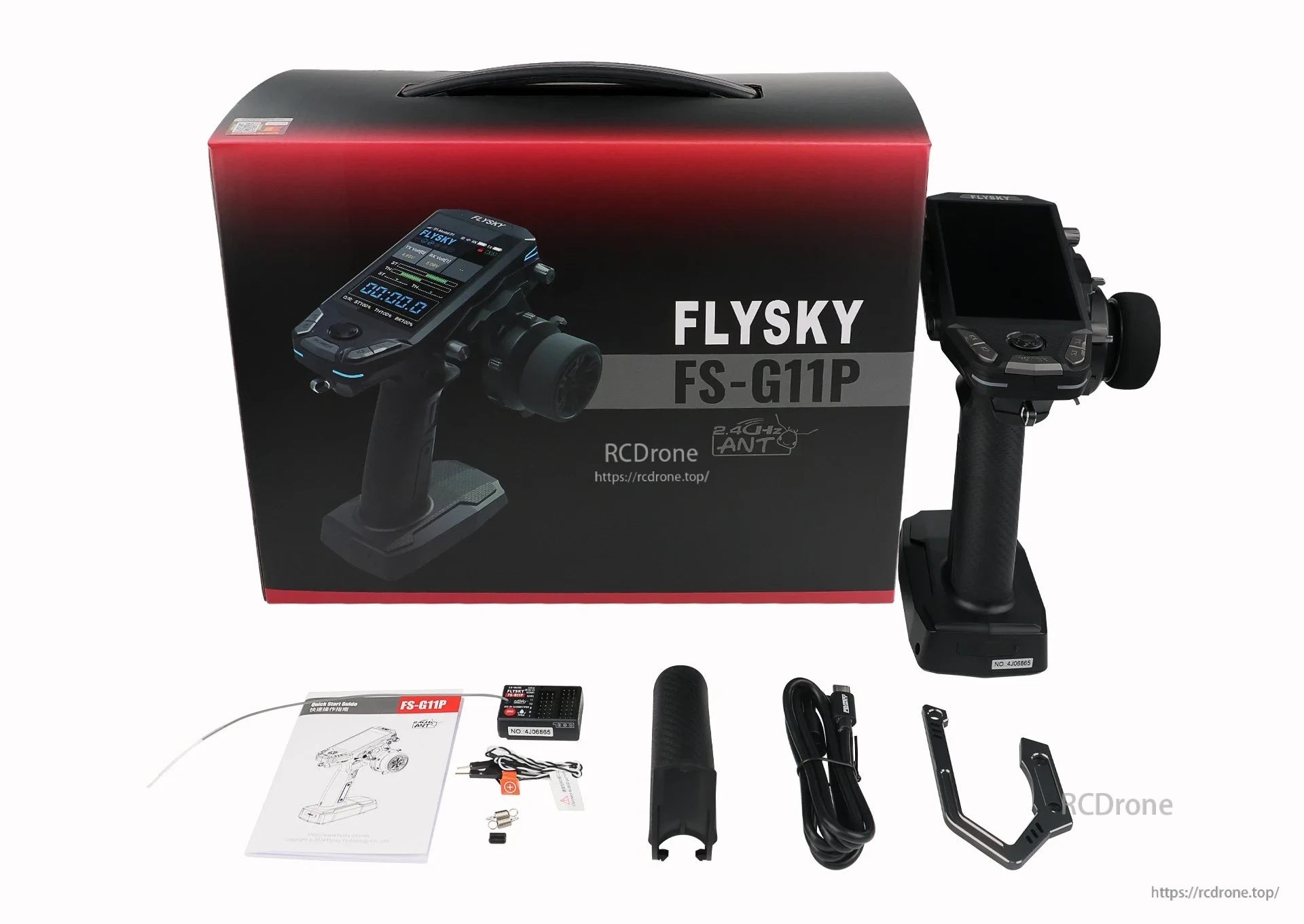 Flysky FS-G11P 2.4GHz surface transmitter set with box, receiver, USB cable, manuals, and accessories