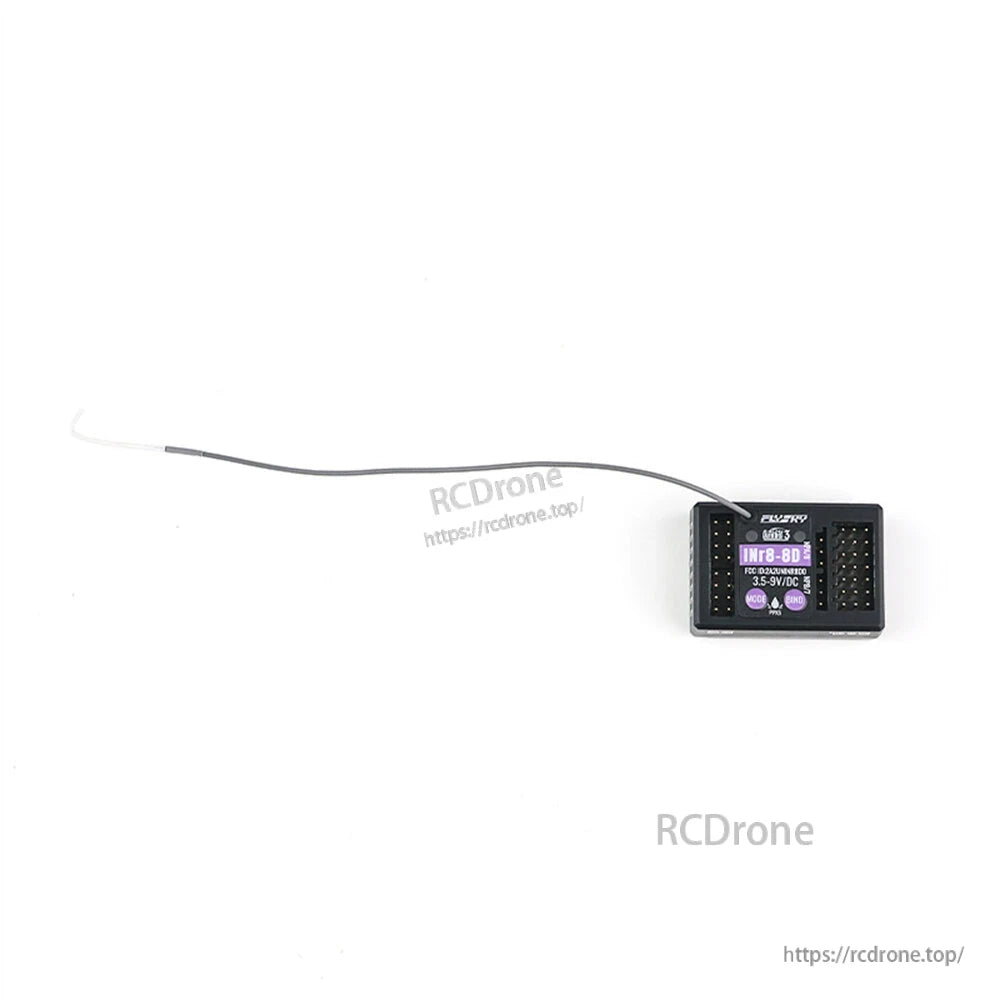 Wide shot showing receiver size with long antenna wire extended on white background