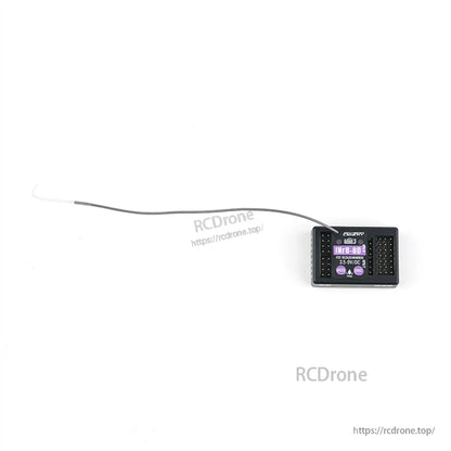 Wide shot showing receiver size with long antenna wire extended on white background