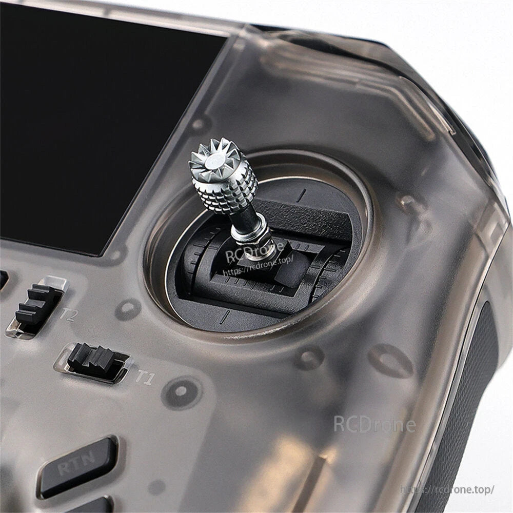 Close-up of right gimbal stick with knurled metal tip and trim markings around the stick