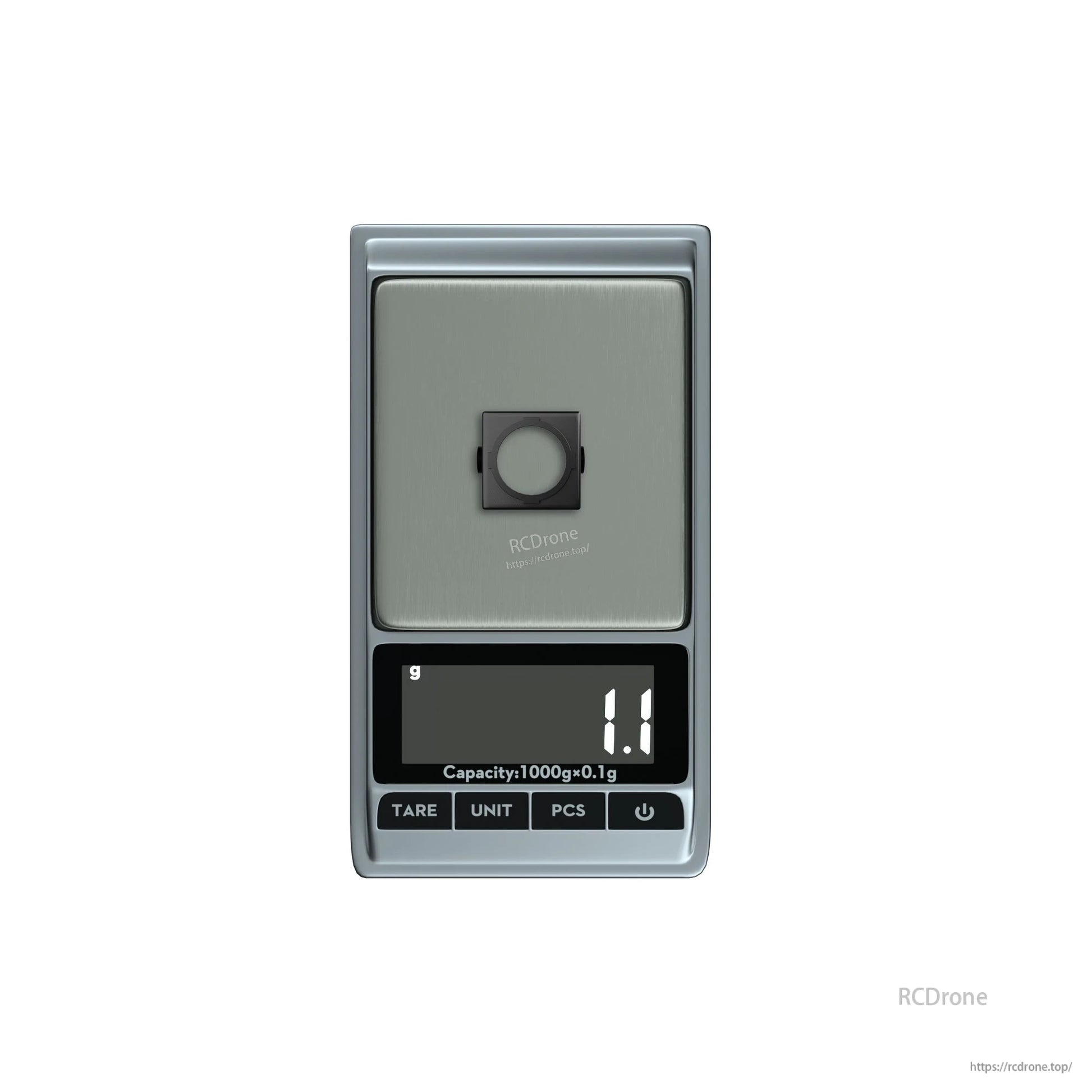 Digital pocket scale with a small square FPV camera part on the platform, displaying 1.1 g.