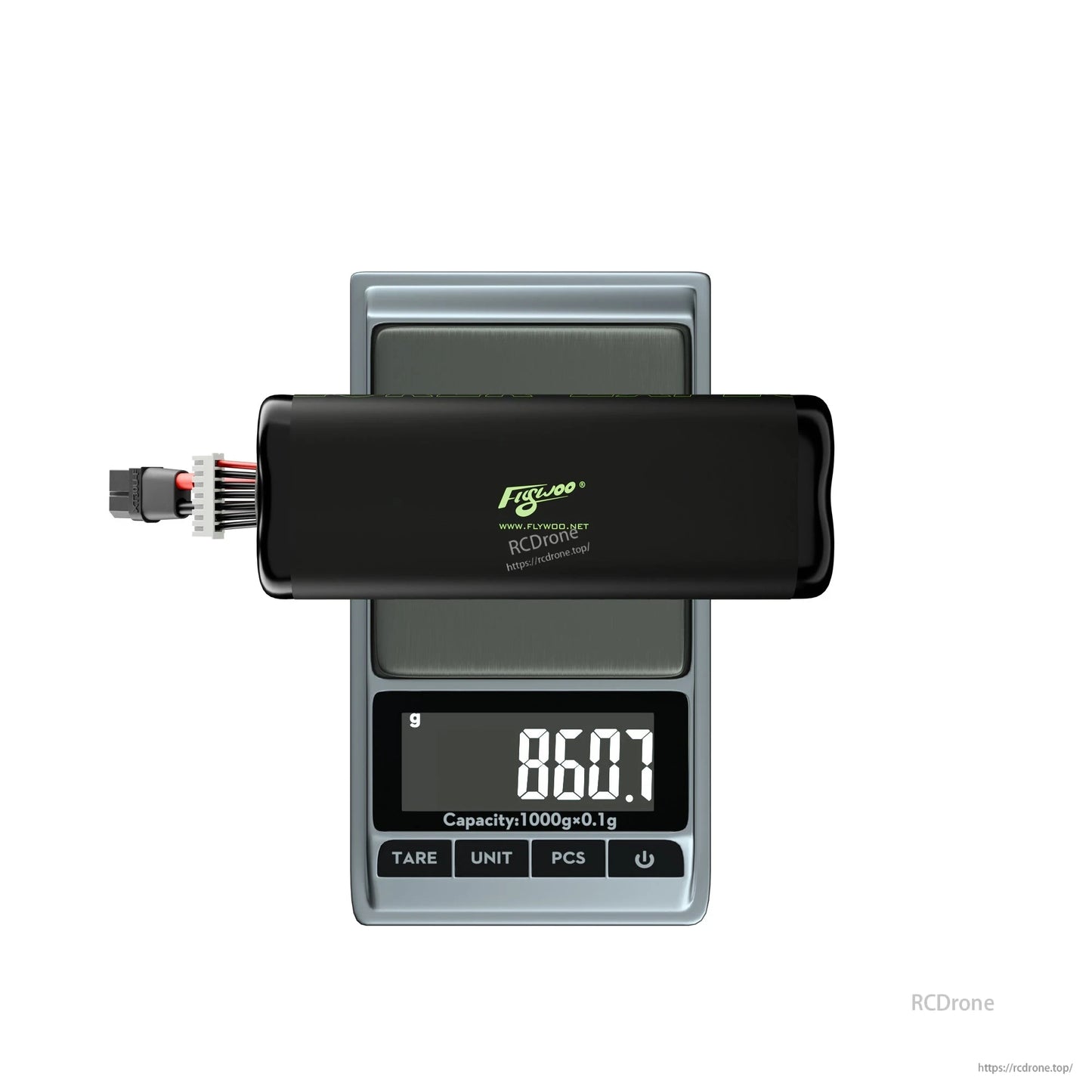 Flywoo Explorer Li-ion drone battery pack with XT60 and balance lead on digital scale reading 860.7 g