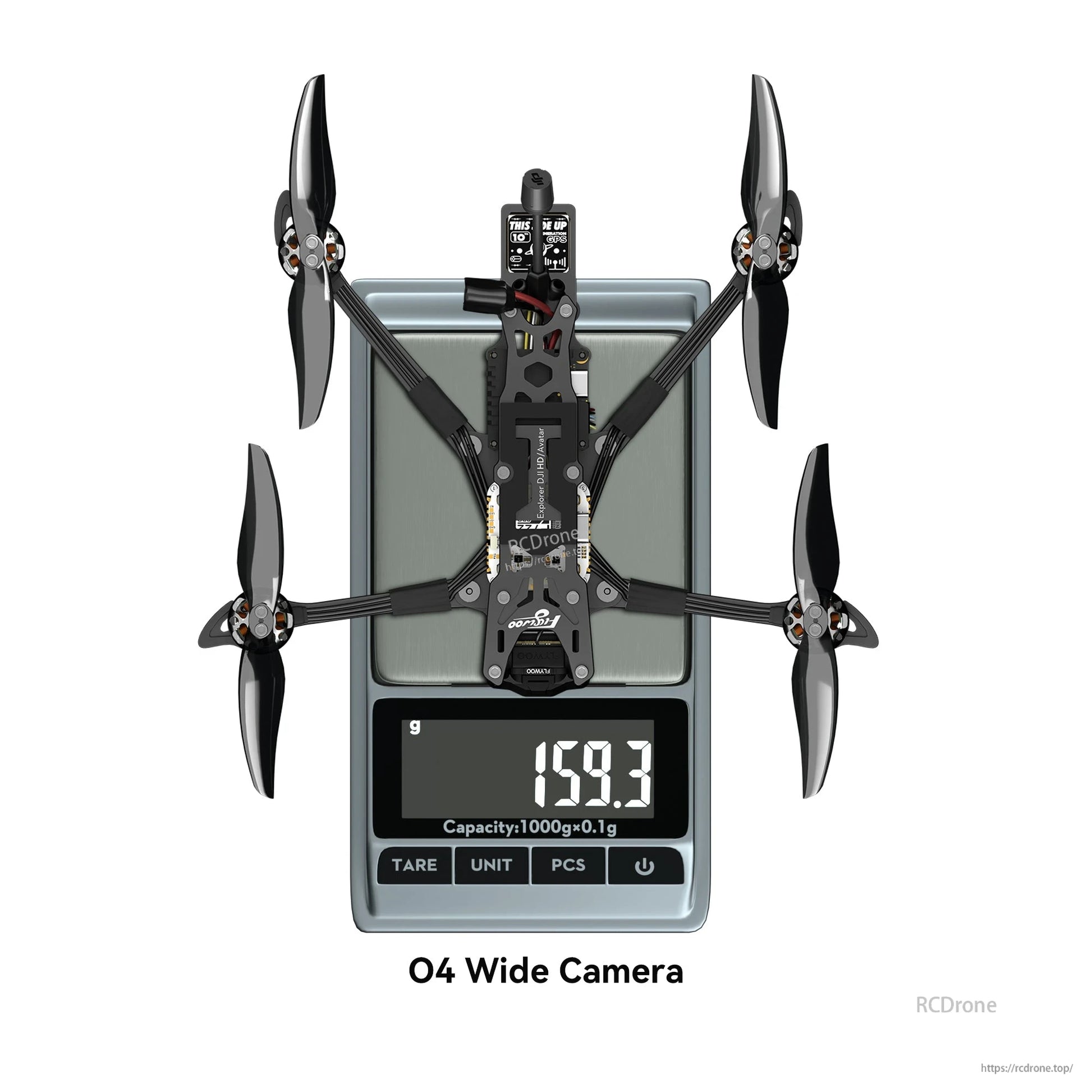 Flywoo Explorer LR 4 O4 Wide 4-inch FPV drone on a digital scale reading 159.3 g, top view