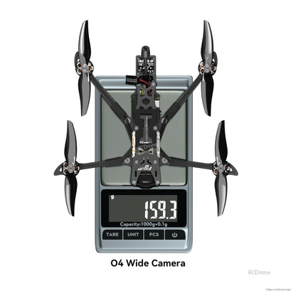 Flywoo Explorer LR 4 O4 Wide 4-inch FPV drone on a digital scale reading 159.3 g, top view