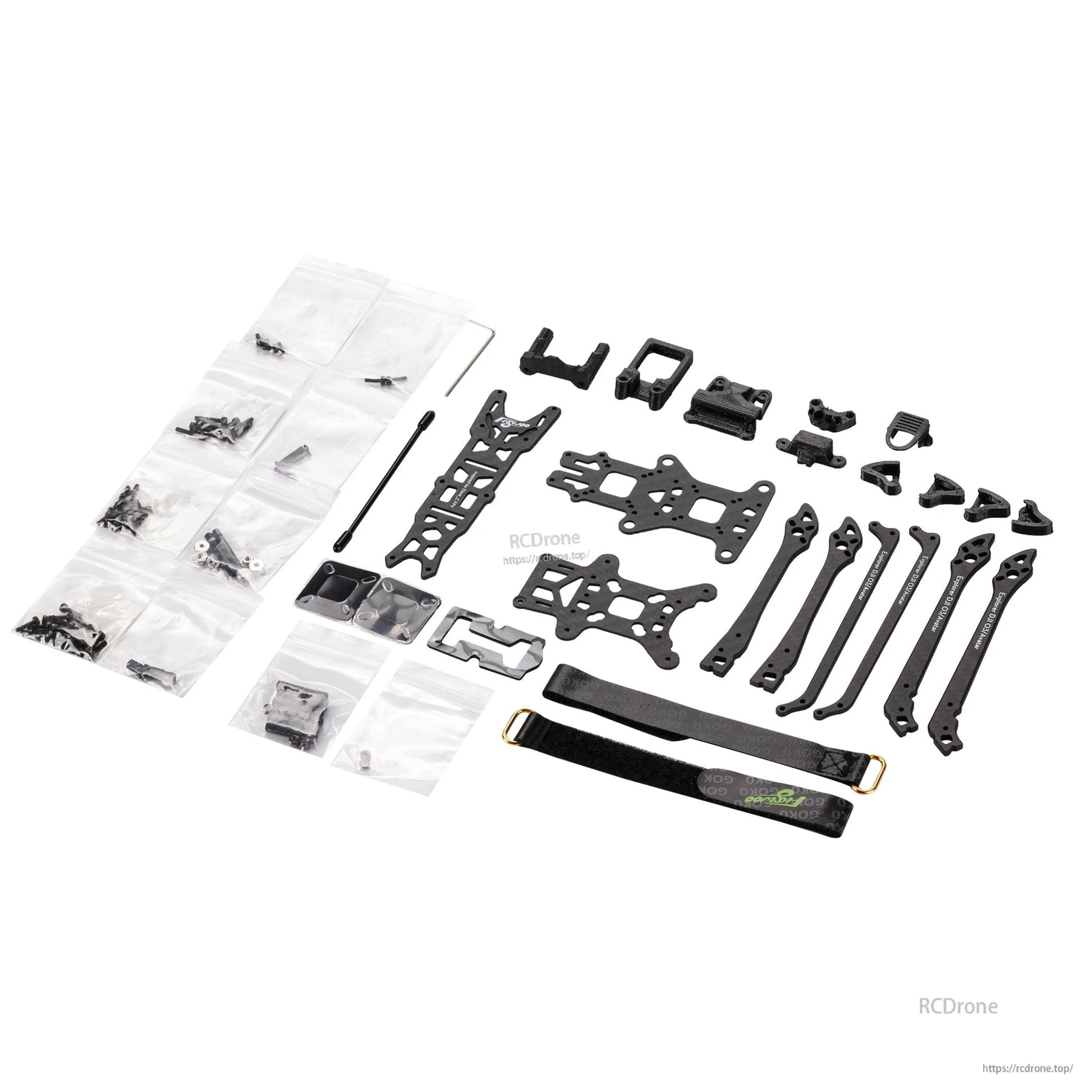 Flywoo Explorer LR4 drone frame kit with carbon fiber plates, arms, hardware packs, 3D-printed mounts, and strap