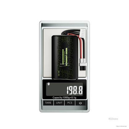 Flywoo Explorer Lionpack 18650 Li-ion battery pack with balance lead and power connector, weighing 198.8 g on scale