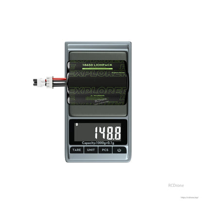 Flywoo Explorer 18650 Li-ion battery pack on a digital scale reading 148.8 g, with lead wires and connector