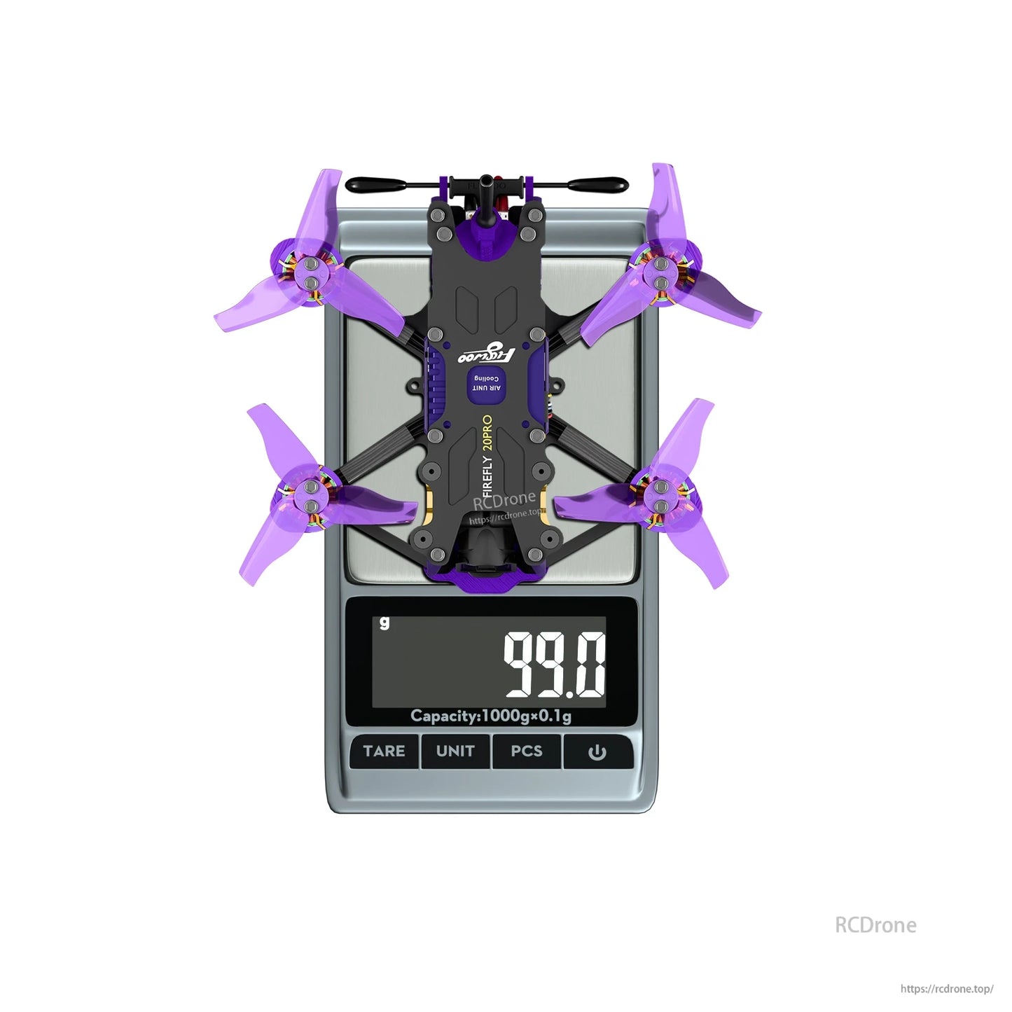 Flywoo Firefly 20PRO micro FPV quadcopter with purple props on a digital scale reading 99.0 g