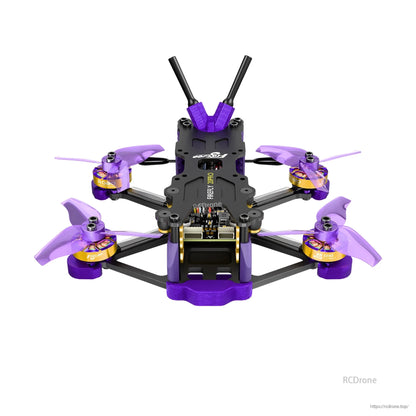 Flywoo Firefly micro FPV quadcopter with purple propellers, four motors, and dual antennas on top plate