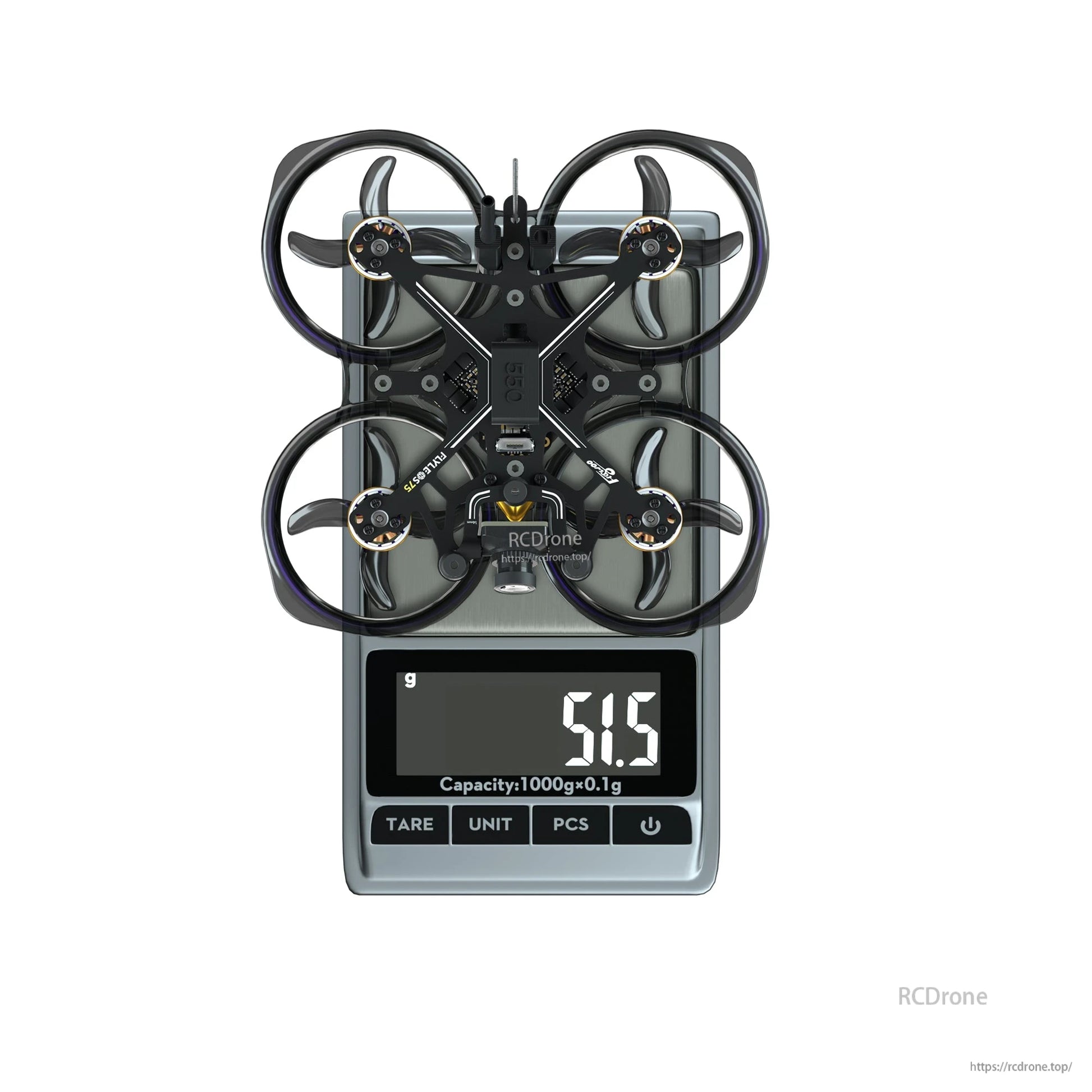 Flywoo FlyLens 75 HD whoop FPV drone on a digital scale, displaying 51.5 g weight reading