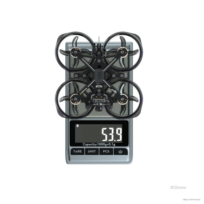 Flywoo FlyLens 75 HD brushless whoop FPV drone on a digital scale with a 53.9 g weight reading