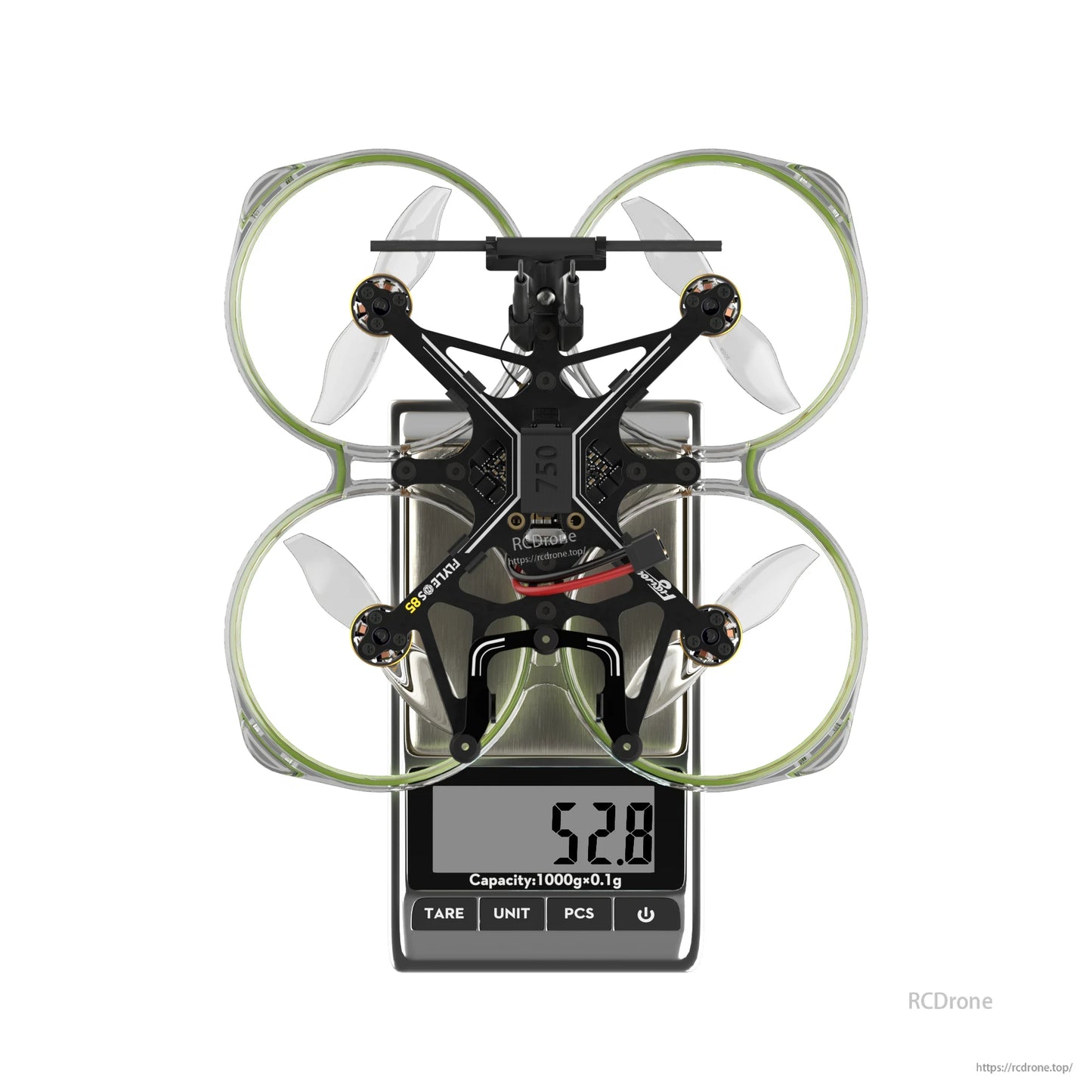 Top view of Flywoo FlyLens 85 brushless whoop drone on a digital scale reading 52.8 g