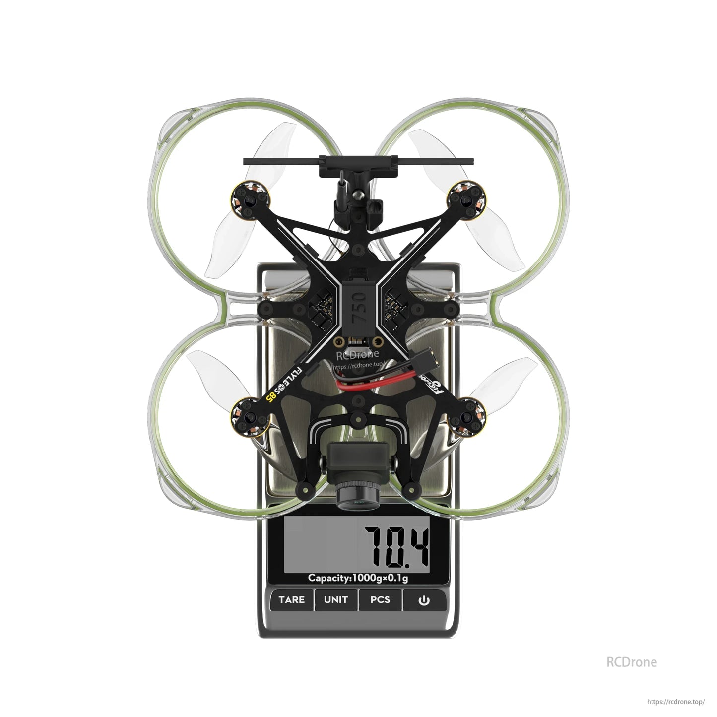 Flywoo FlyLens 85 HD brushless whoop FPV drone on a digital scale showing 70.4 g
