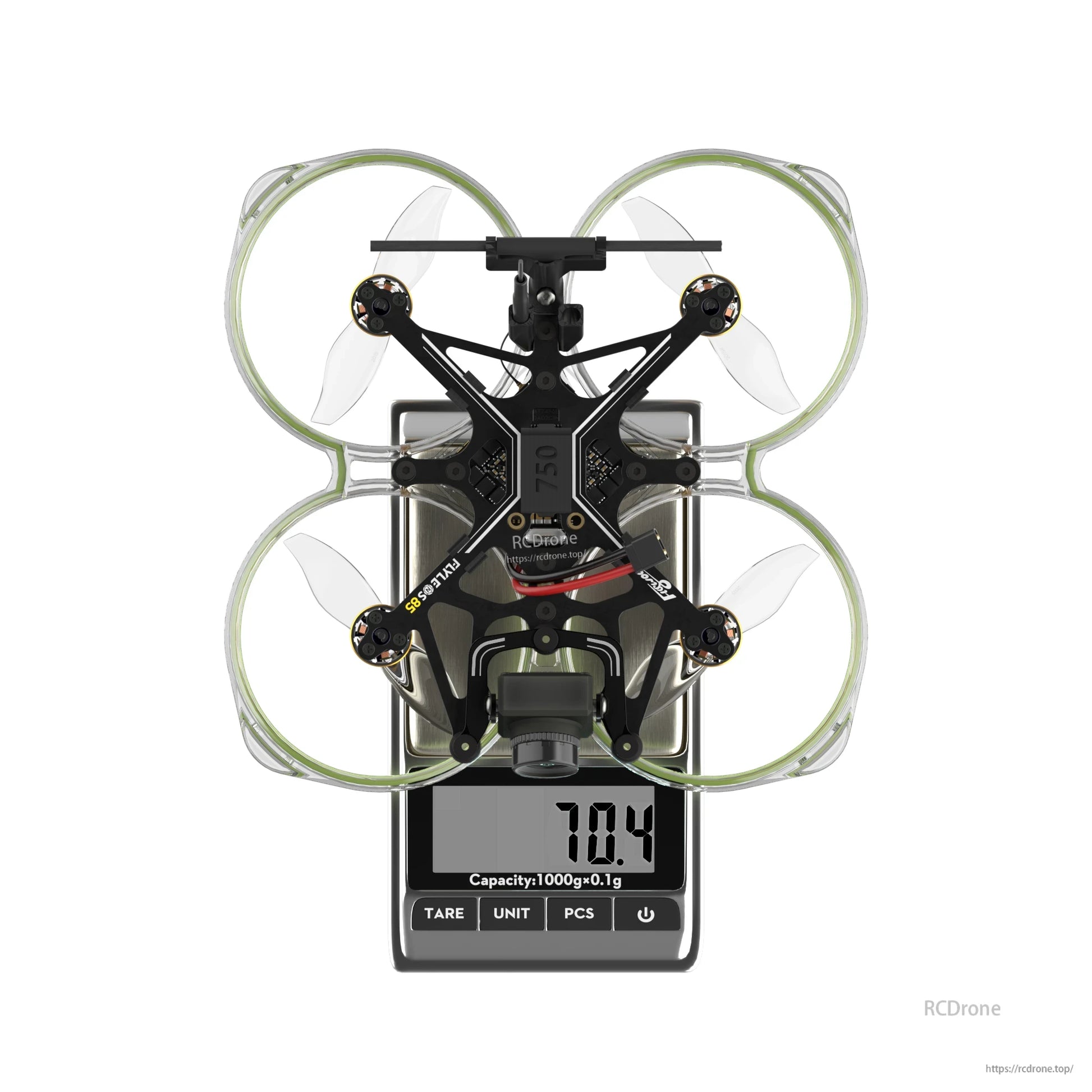 Flywoo FlyLens 85 HD brushless whoop FPV drone on a digital scale showing 70.4 g