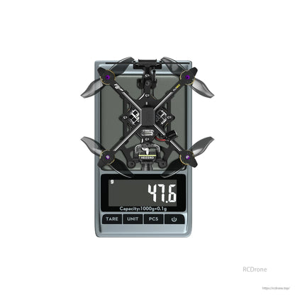 Flywoo Flybee 20 HDZero 2S Ultralight FPV, Flywoo Flybee 20 HDZero ultralight FPV quadcopter on a digital scale reading 47.6 g