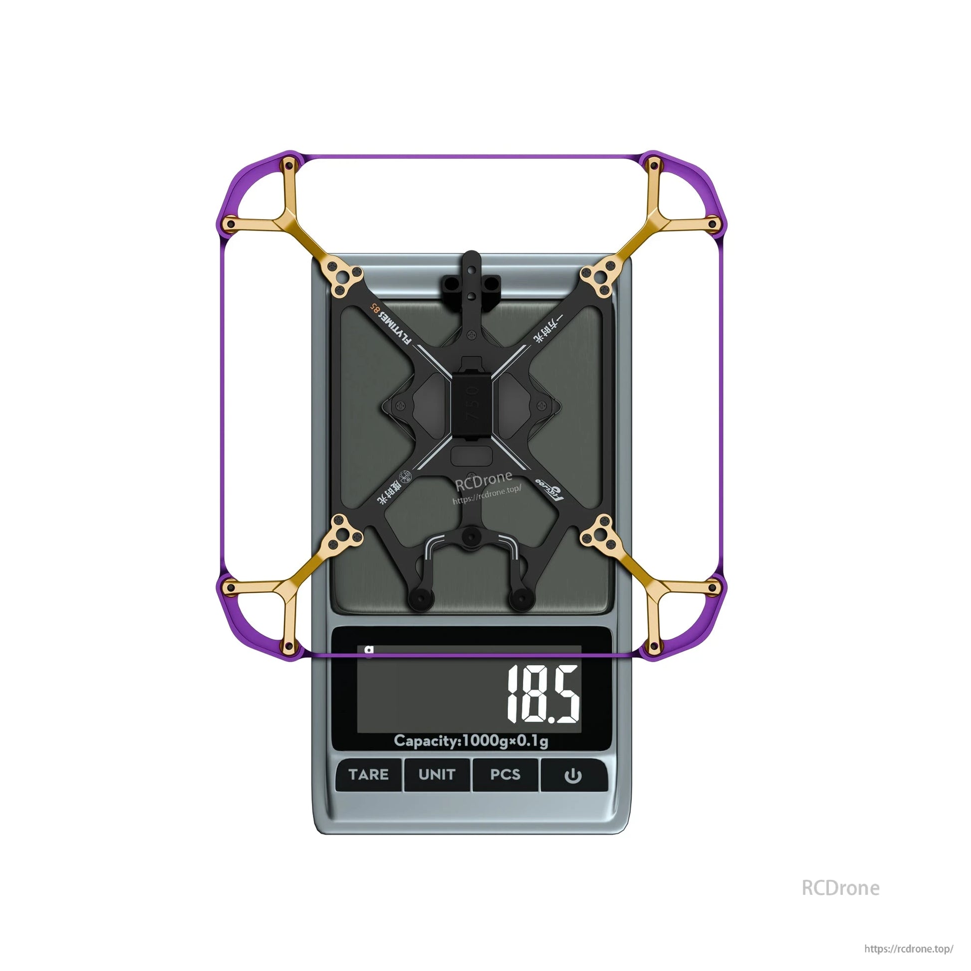 Flywoo Flytimes 85 micro drone frame with purple prop guards on a digital scale reading 18.5g
