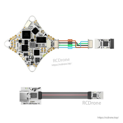 Flywoo GOKU F405 ERVT AIO flight controller with labeled pads and BB/TF USB Reader V1 ribbon cable adapter