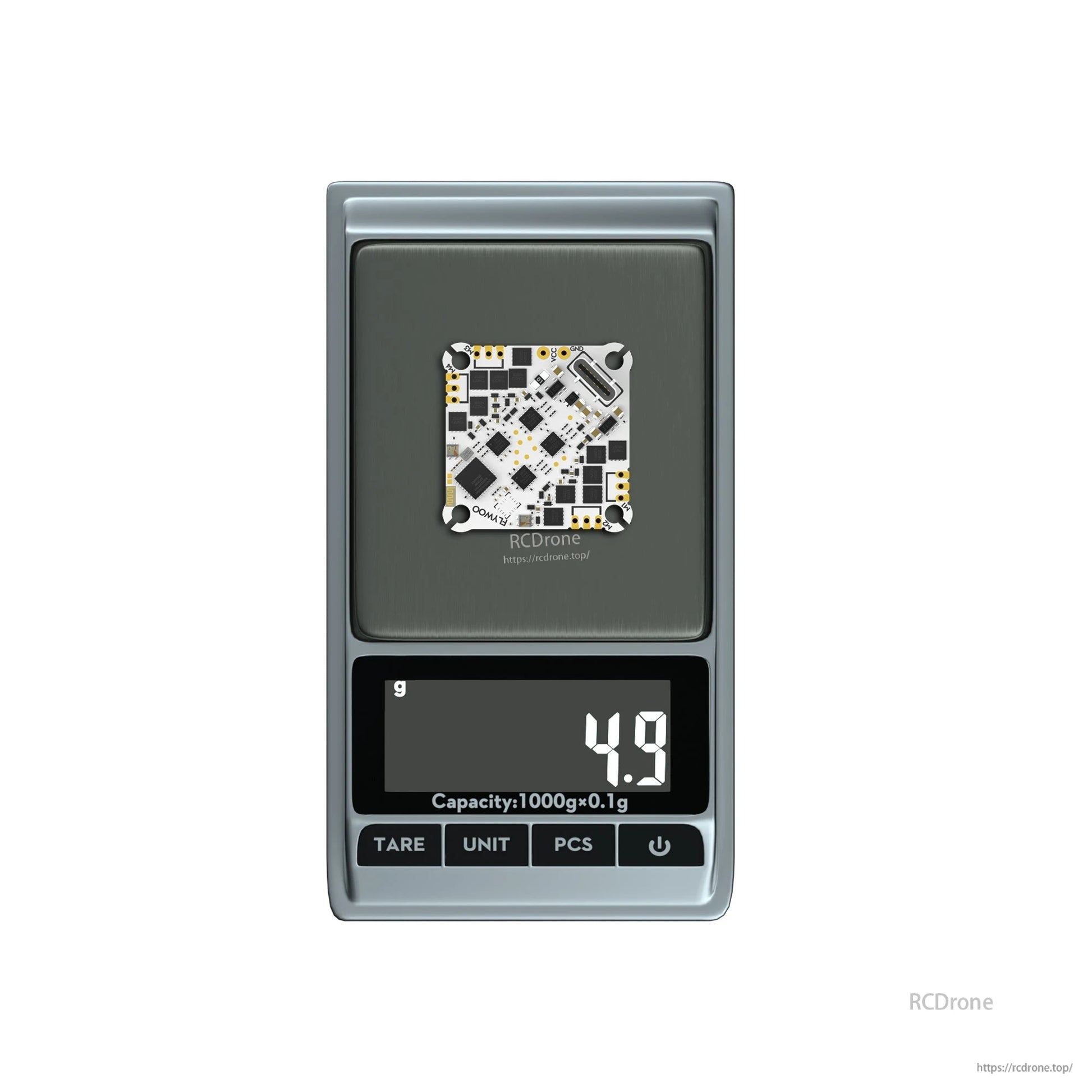 Flywoo GOKU F405 HD AIO flight controller PCB on a digital scale showing 4.9 g weight