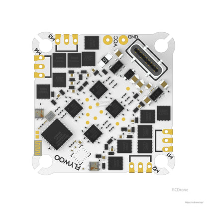 Flywoo GOKU F405 HD AIO flight controller board with USB-C port and labeled VCC/GND and motor solder pads
