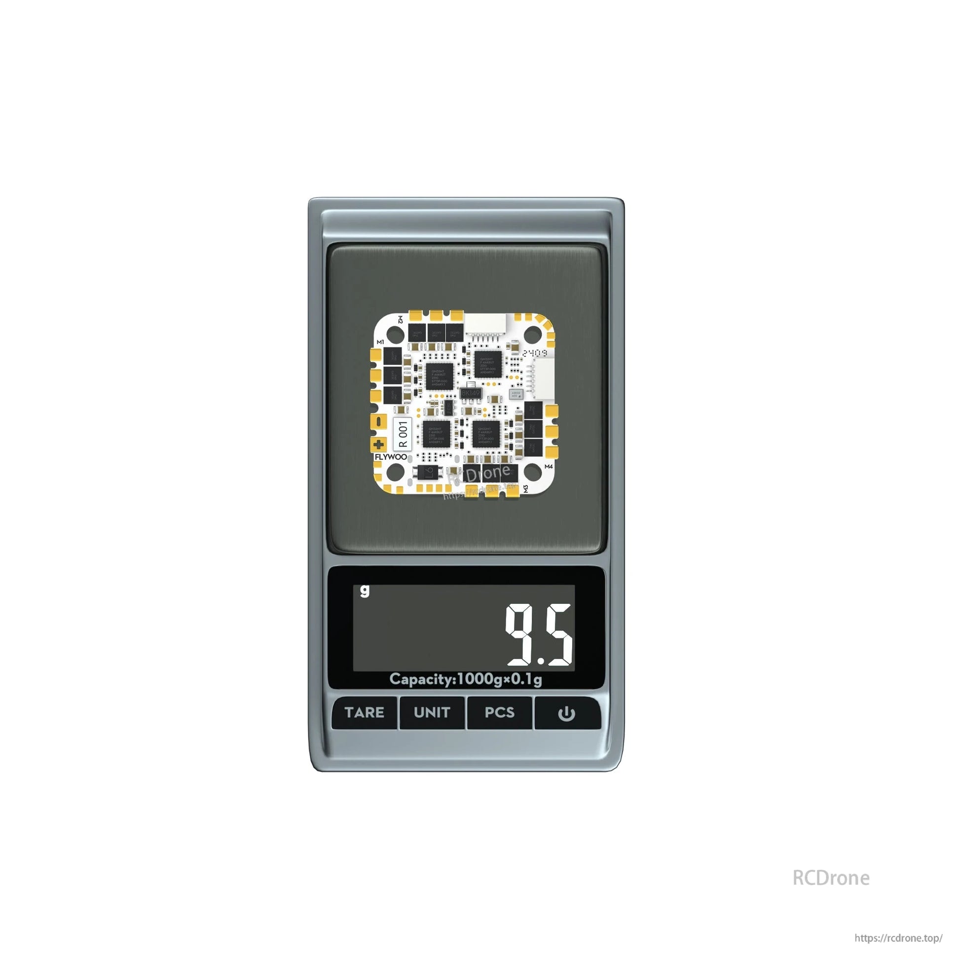 Flywoo GOKU GN745 V3 45A AIO flight controller board on a digital scale reading 9.5 g