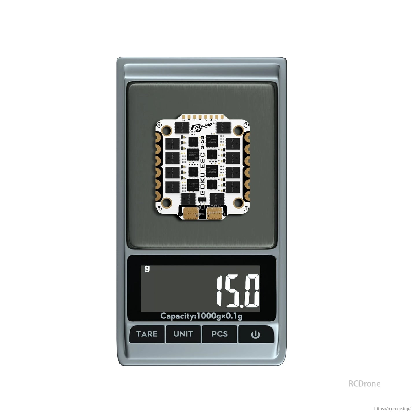 Flywoo GOKU ESC 3–6S board on a digital scale showing 15.0 g, part of the GOKU H743 Pro FC + ESC stack