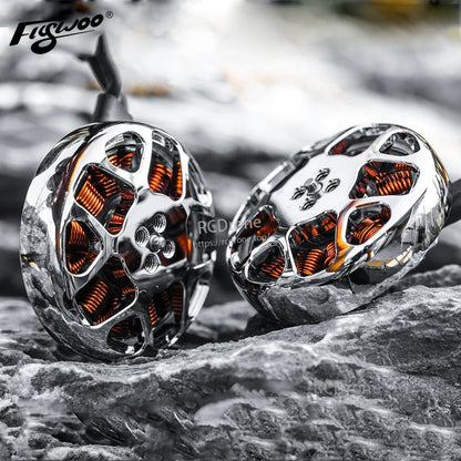Close-up of Flywoo NIN 2303.5 ultralight FPV motor with silver bell housing and exposed copper windings