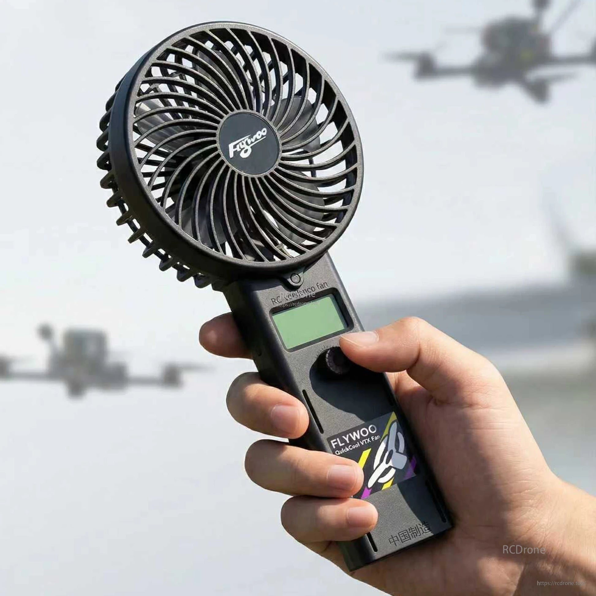Flywoo QuickCool VTX Portable Fan, Flywoo QuickCool VTX portable handheld fan with large round grille, small LCD screen and thumb control dial