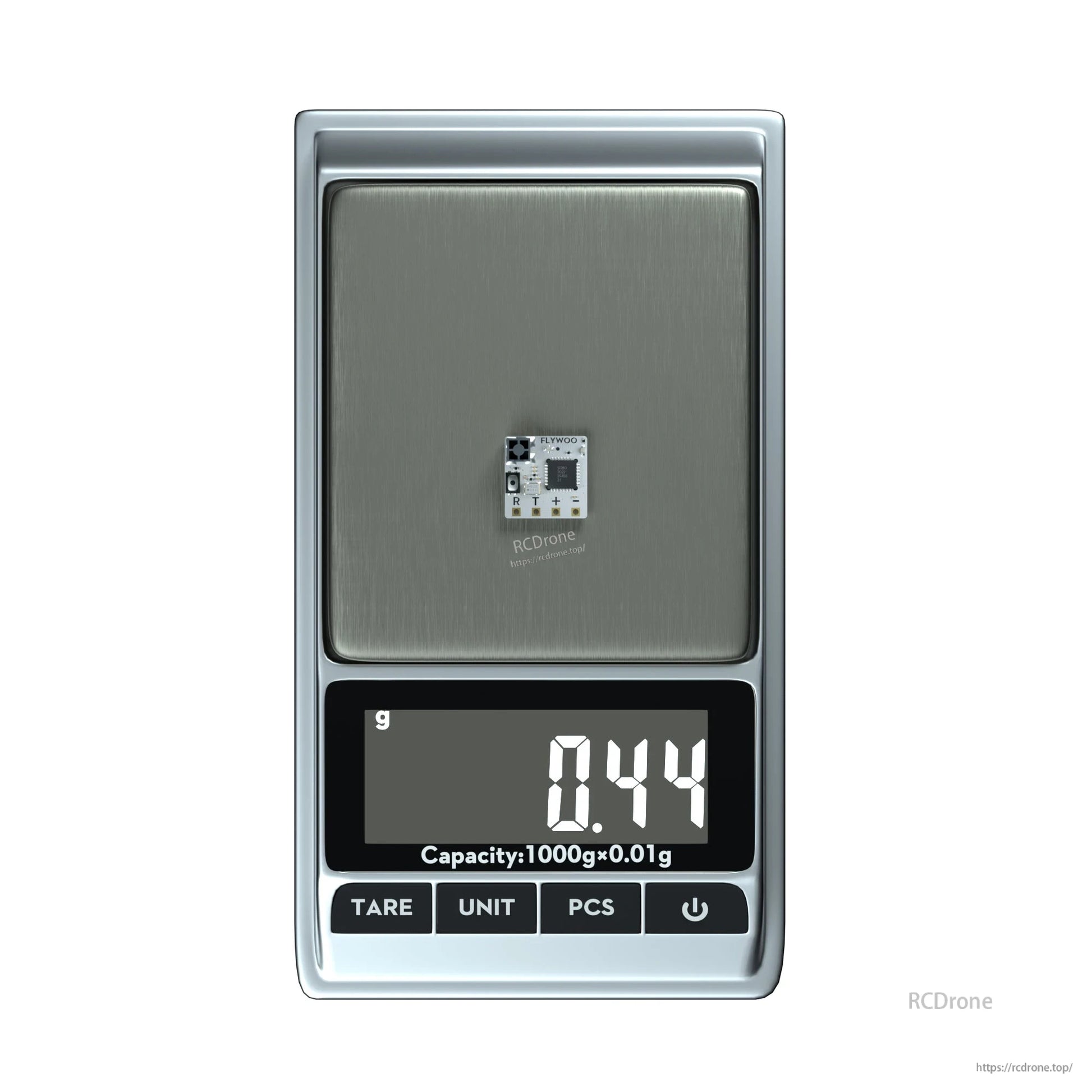 Flywoo TCXO 2.4G ELRS Receiver, Flywoo 2.4GHz ELRS receiver micro PCB on a digital scale reading 0.44 g