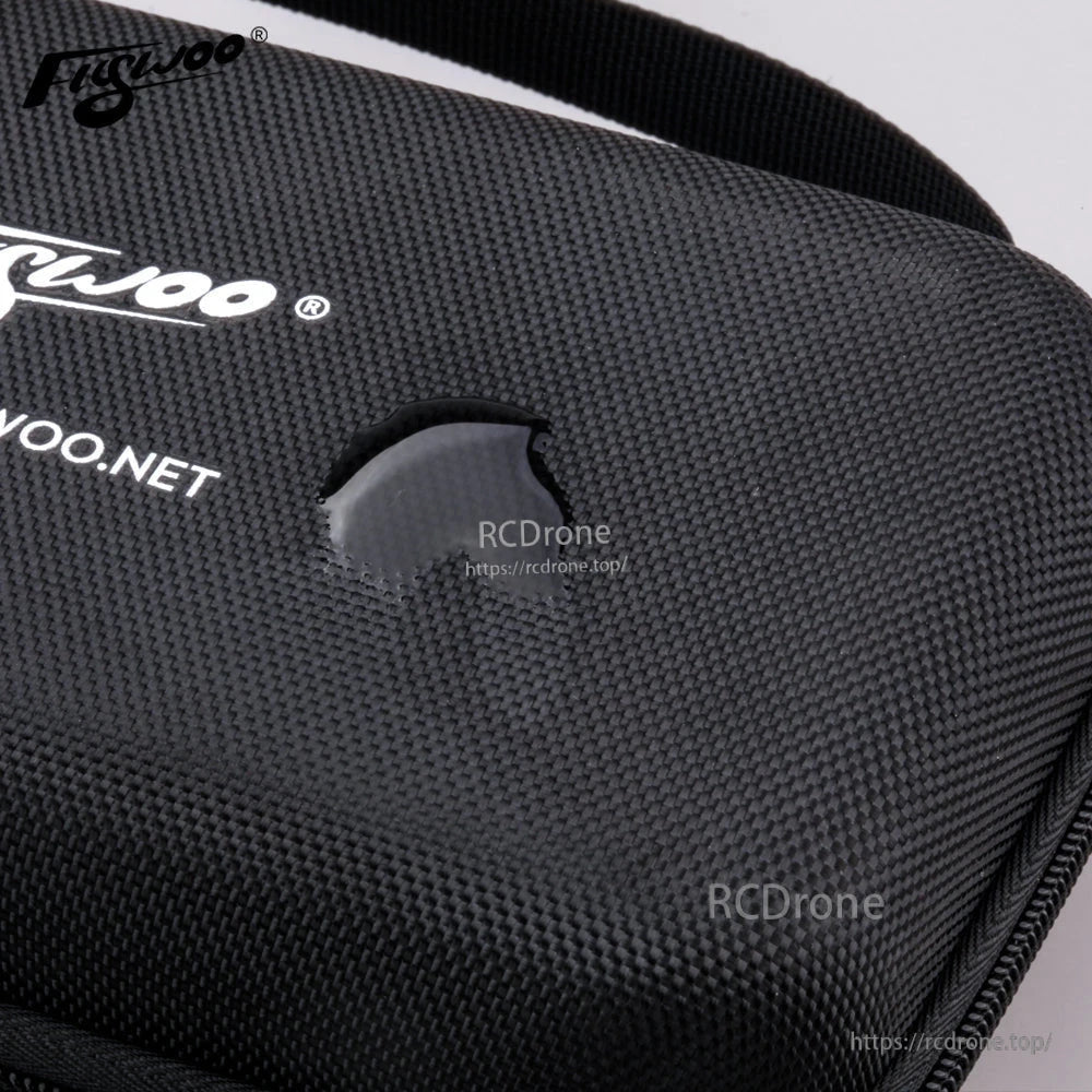 Close-up of Flywoo tool bag with black textured fabric, zippered edge, and carry handle