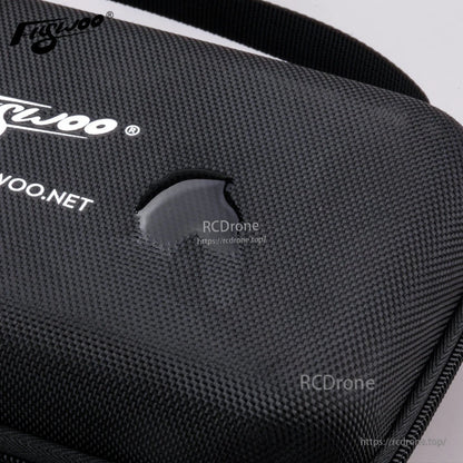 Close-up of Flywoo tool bag with black textured fabric, zippered edge, and carry handle