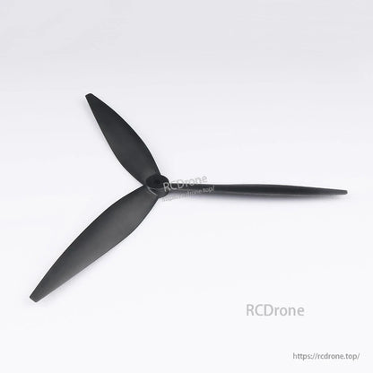 Black Foxeer Cyclone T1050 tri-blade drone propeller with central mounting hub on a white background