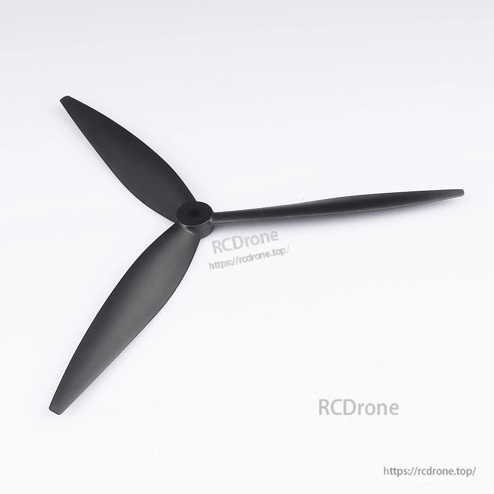 Black 3-blade Foxeer Cyclone T9046 9-inch drone propeller with center mounting hub on white background