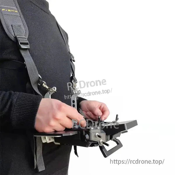 Side view of strap and tray in use with RC transmitter, showing angle and mounting bracket position