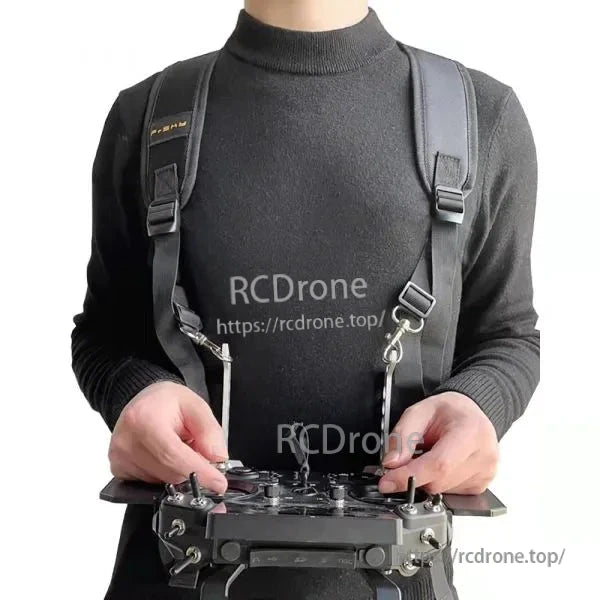 Shoulder strap in use holding RC transmitter on tray, front view with harness attachment clips