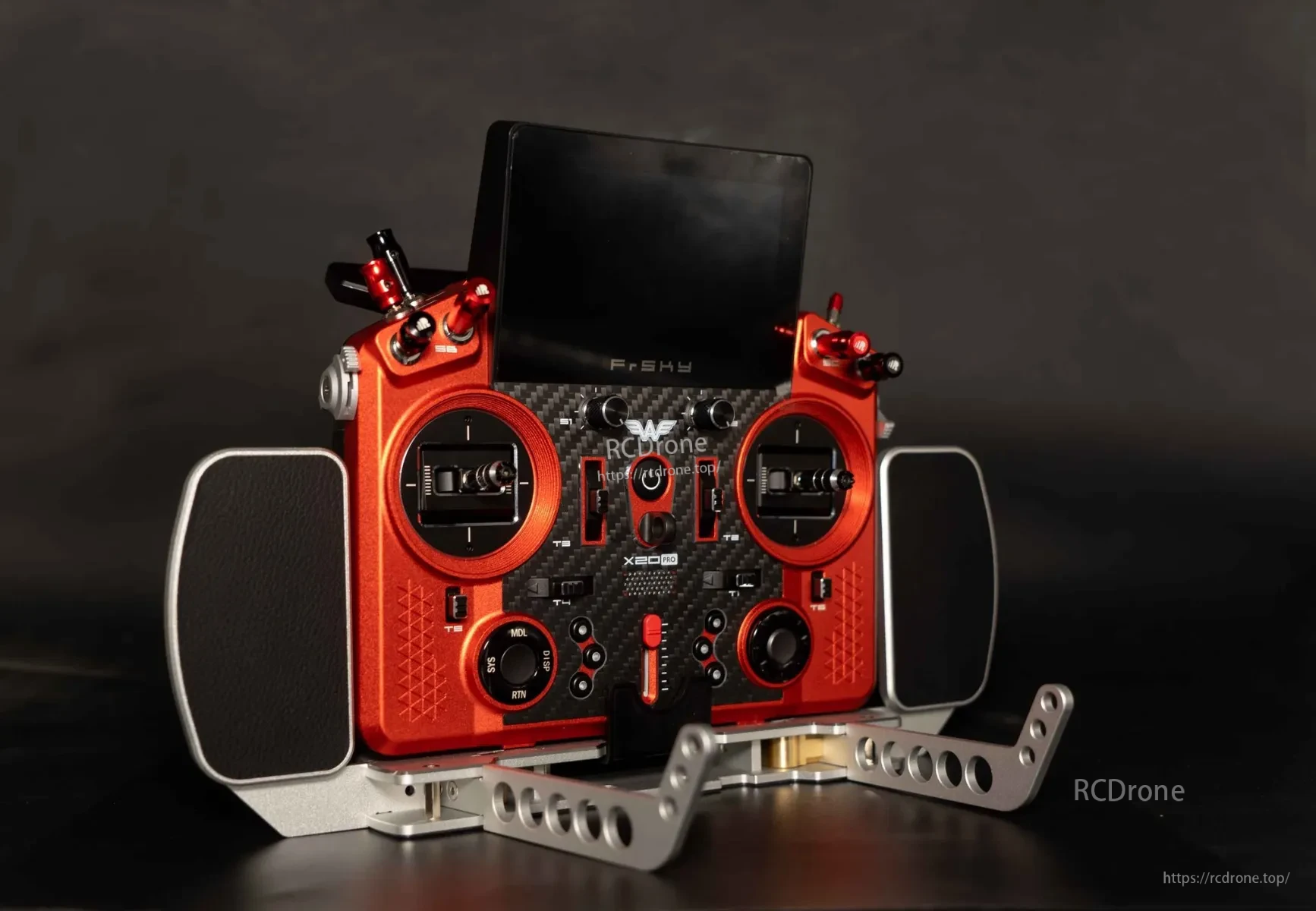 FrSky CNC metal transmitter tray mounted on Tandem X20 radio, with side hand rests and strap bracket holes