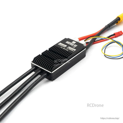 FrSky Neuron II 80A ESC angled view showing finned heatsink body and cable routing