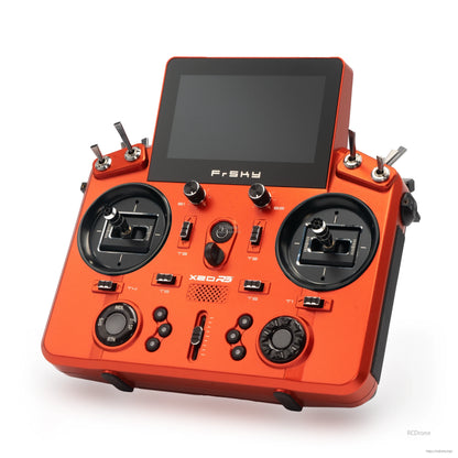 Red TANDEM X20RS transmitter angled view showing gimbal sticks, switches, and touchscreen
