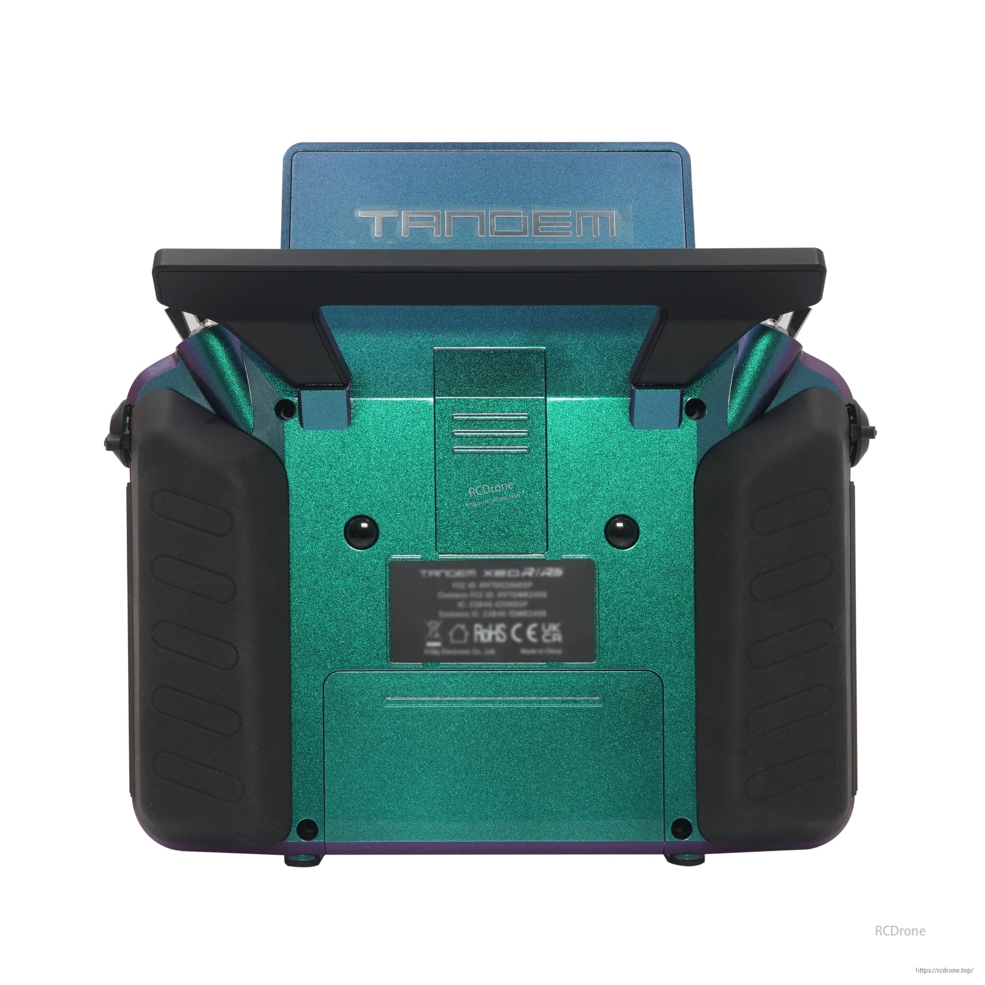 TANDEM X20RS transmitter rear view in teal showing hand grips and rear module/battery cover area