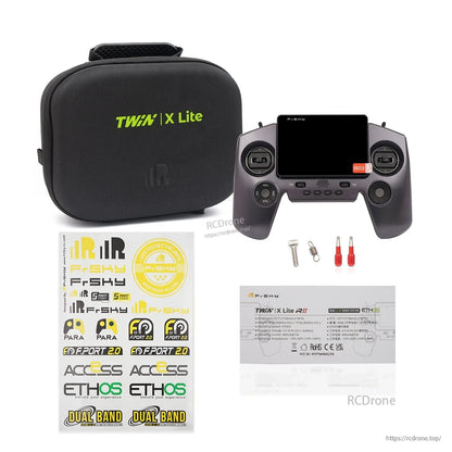 Carrying case bundle with gray transmitter, sticker sheet, screws, tools, and instruction card