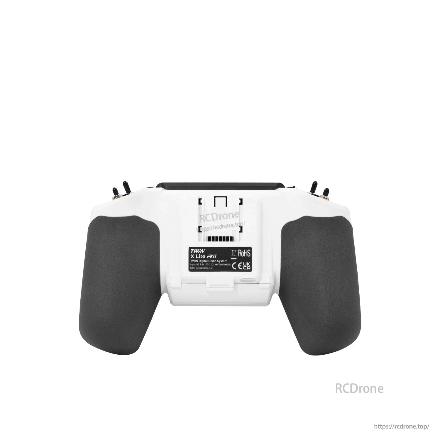 White transmitter rear view showing grip backs and product label with compliance icons
