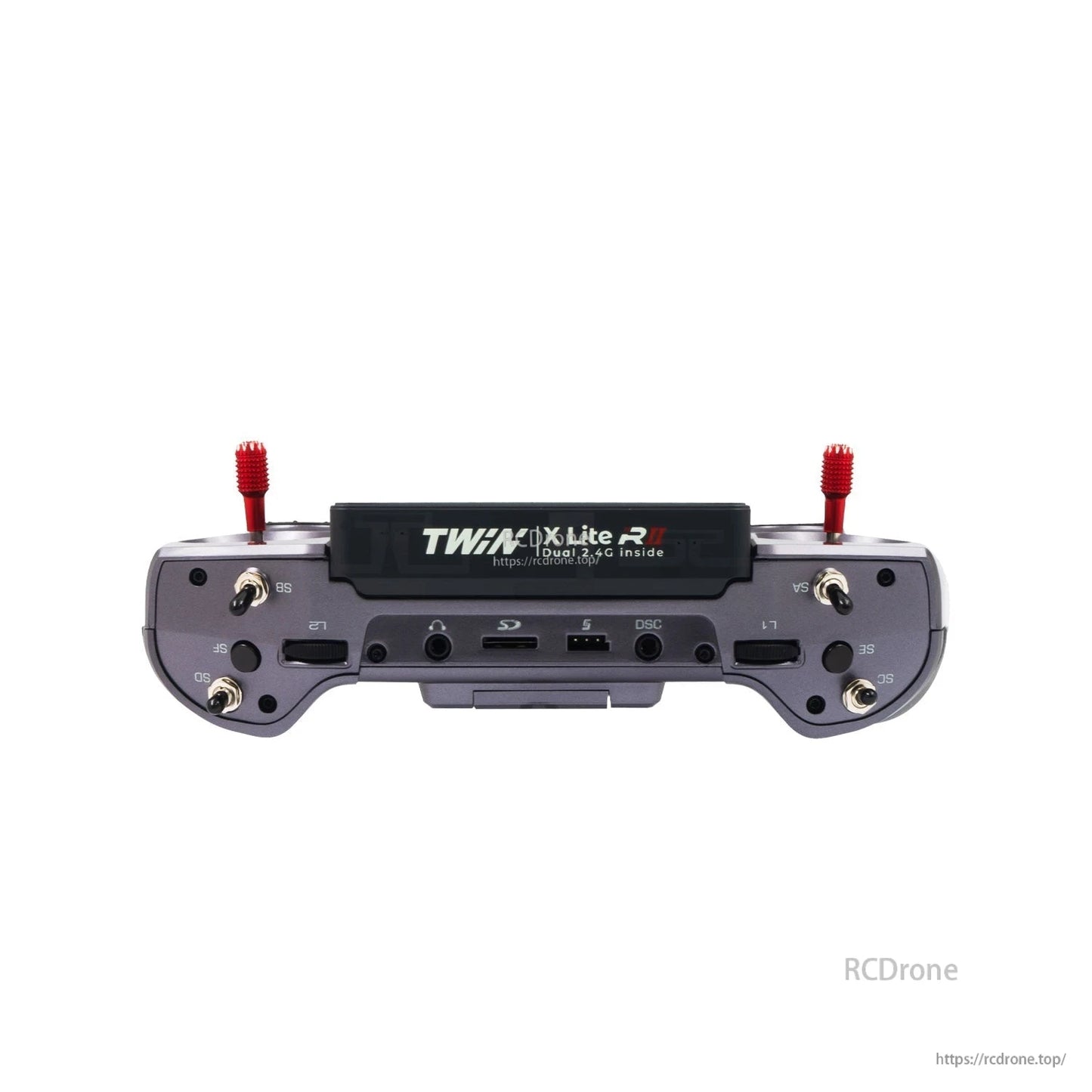Gray transmitter bottom edge view showing labeled ports and switches with two red stick ends